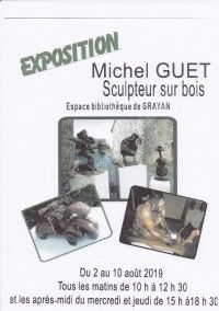 Exposition de sculptures sur bois